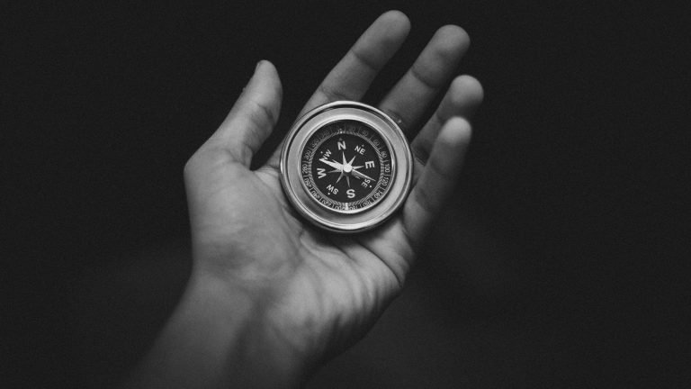 A hand holds a small compass that is not pointing north. This could represent feeling loss from depression. Learn more about depression treatment in Pasadena, CA, online depression therapy in California, and other services. 95814 | 95688 | 95765