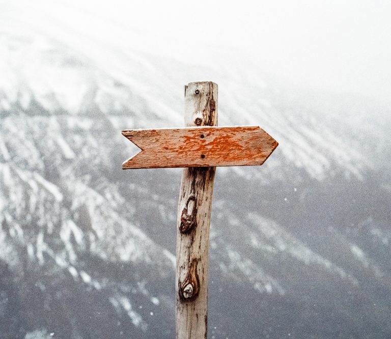 A wooden sign arrow points to the left on a snowy mountain trail. This could represent the help of a individual therapist. Contact our practice to learn more about individual therapy in Pasadena, CA, individual therapy for depression, and other services. 95762 | 95757 | 95624