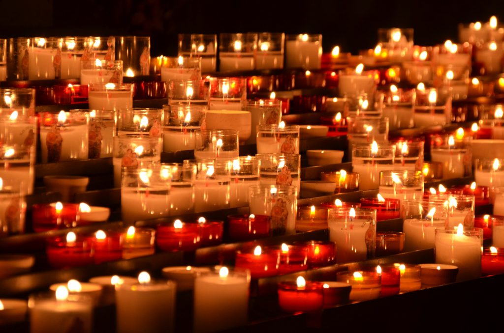  Candles burn at a shrine as a memorial to a loved one. Grief Counseling in Sacremanto, CA can help. 95688