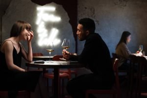 A couple has a romantic dinner together. Learn more tips for rebuilding your relationship in Therapy for Couples in Pasadena, CA.